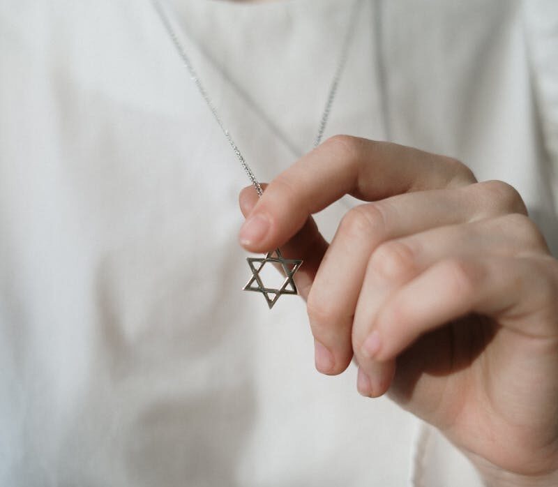 Person Holding a Star of David